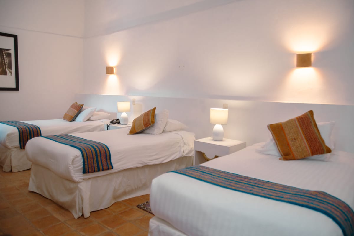 Superior Triple Room — 28 m² · 3 double beds · 3 guests