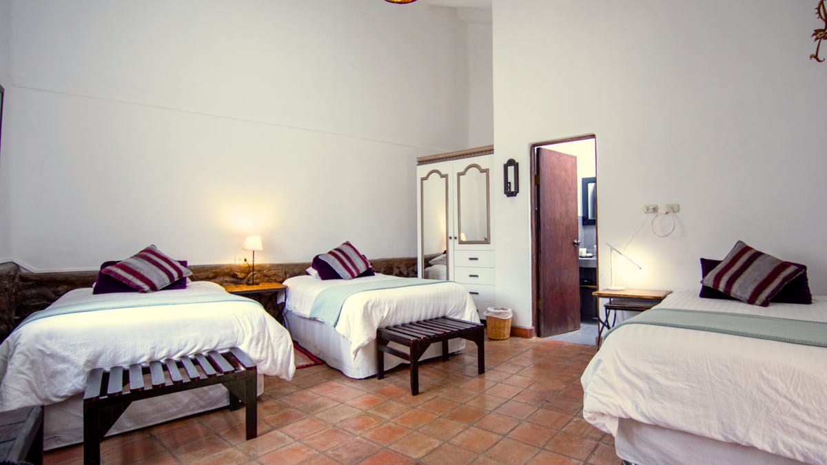 Classic Triple Room — 25 m² · 3 single beds · 3 guests